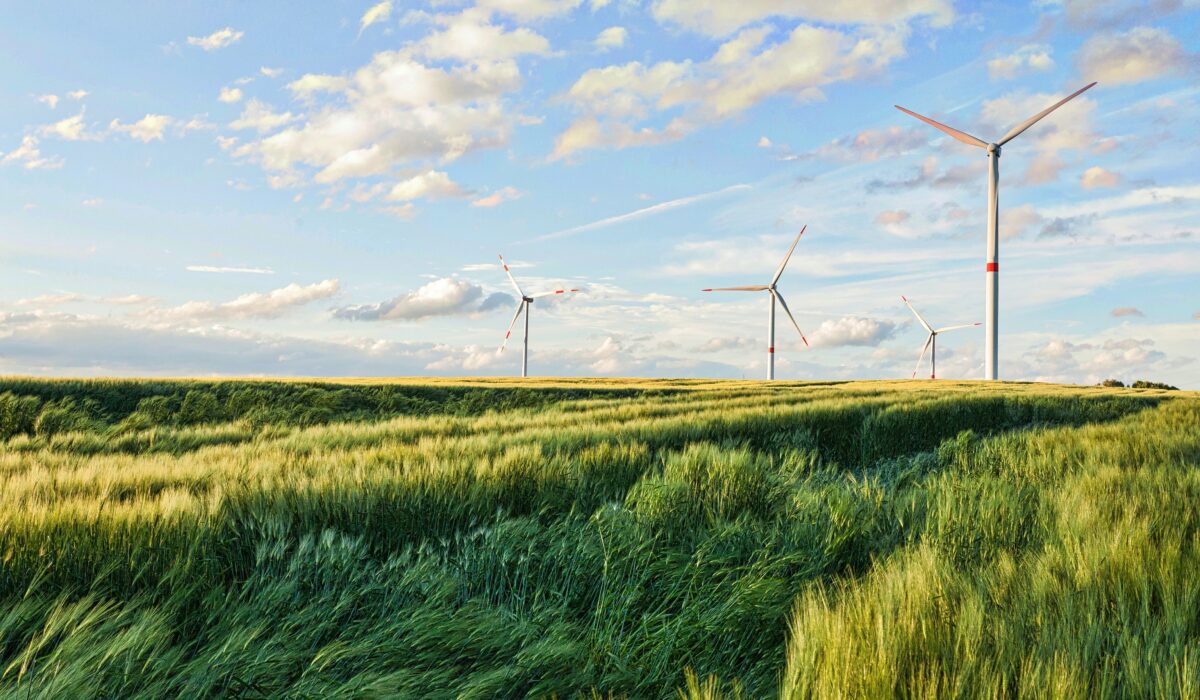 A beautiful shot of wind turbines under the cloudy sky in the Eiffel region, Germany